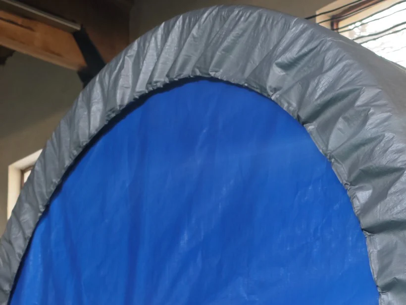 Packaged conveyor belt roll protected and prepared for dispatch